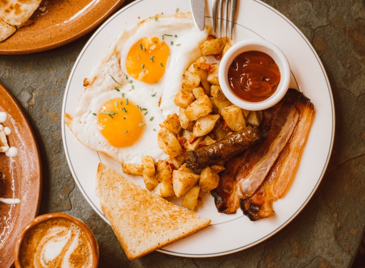 Traditional Breakfast with Fried Eggs, Sausage, Bacon and Home Fries Recipe